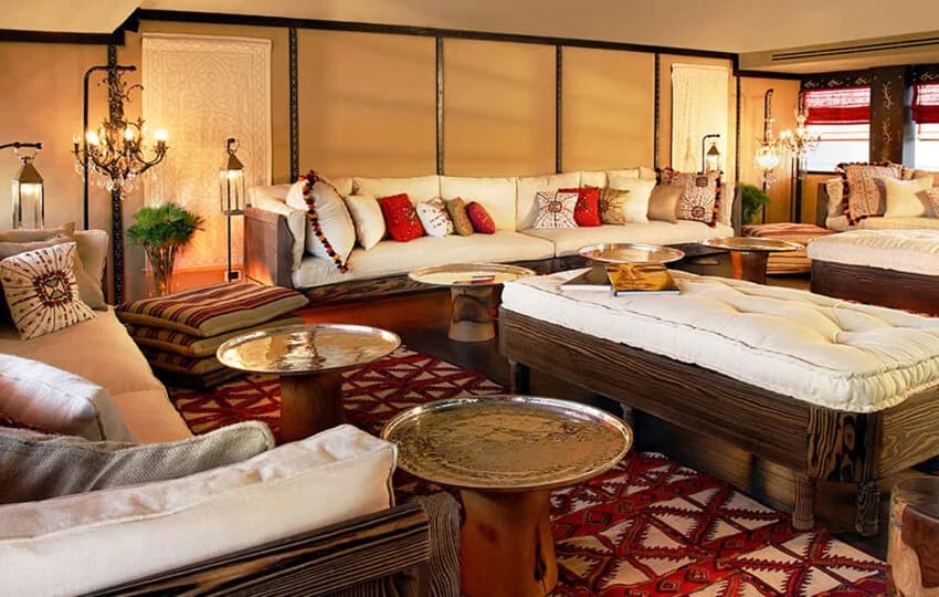 Luxurious cabins with four-poster beds and elegant furnishings